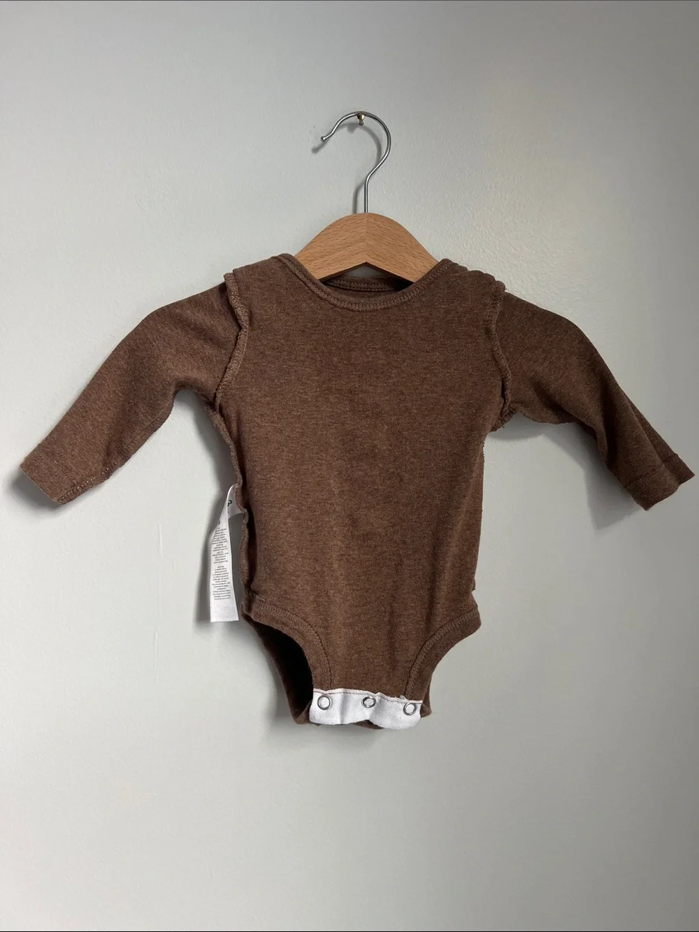Carter’s | Brown Football-Stitch Long-Sleeve Baby One-Piece Size 3 Months
